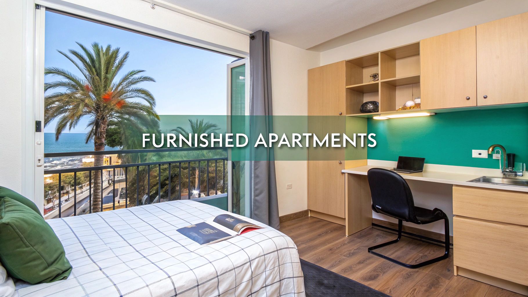 A modern furnished apartment bedroom with a bed, desk, shelves, and a chair, overlooking a balcony with a view of palm trees and the sea. Text overlay reads "FURNISHED APARTMENTS.