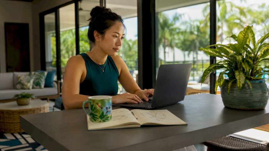 Woman using digital leasing platform at home