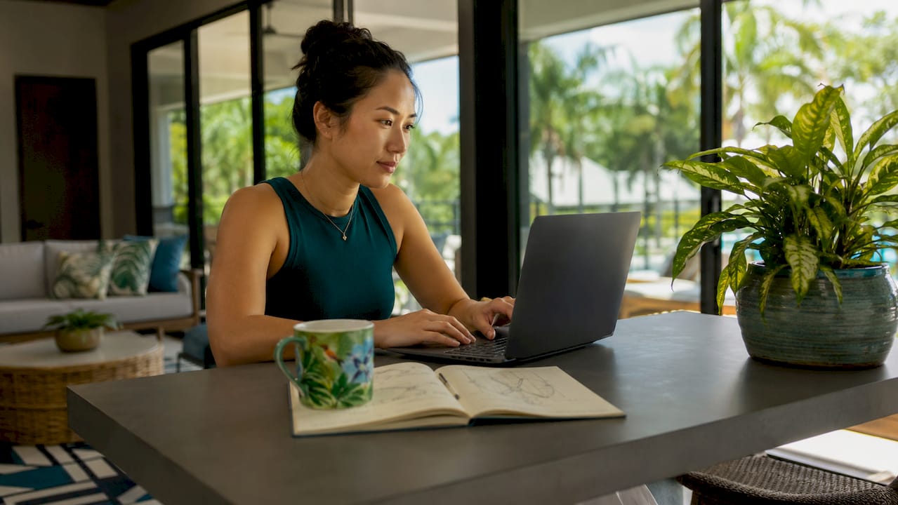 Woman using digital leasing platform at home