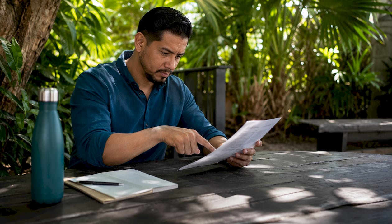 Man reviewing housing discrimination documents