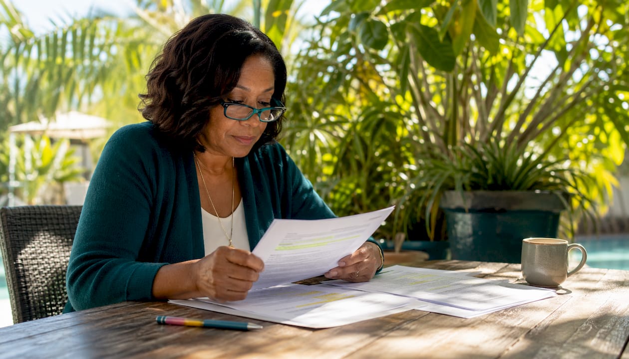 Woman reviewing fair housing policies at home