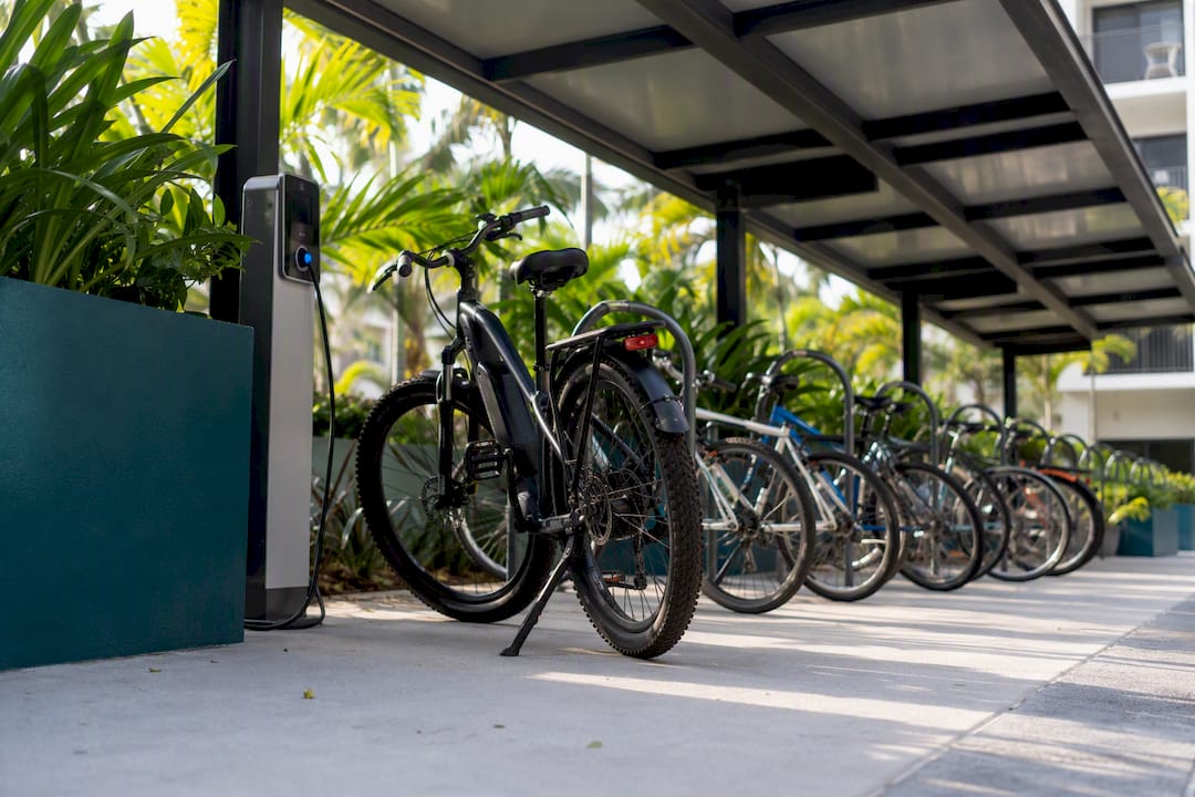 Modern secure bike storage room with e-bike charging
