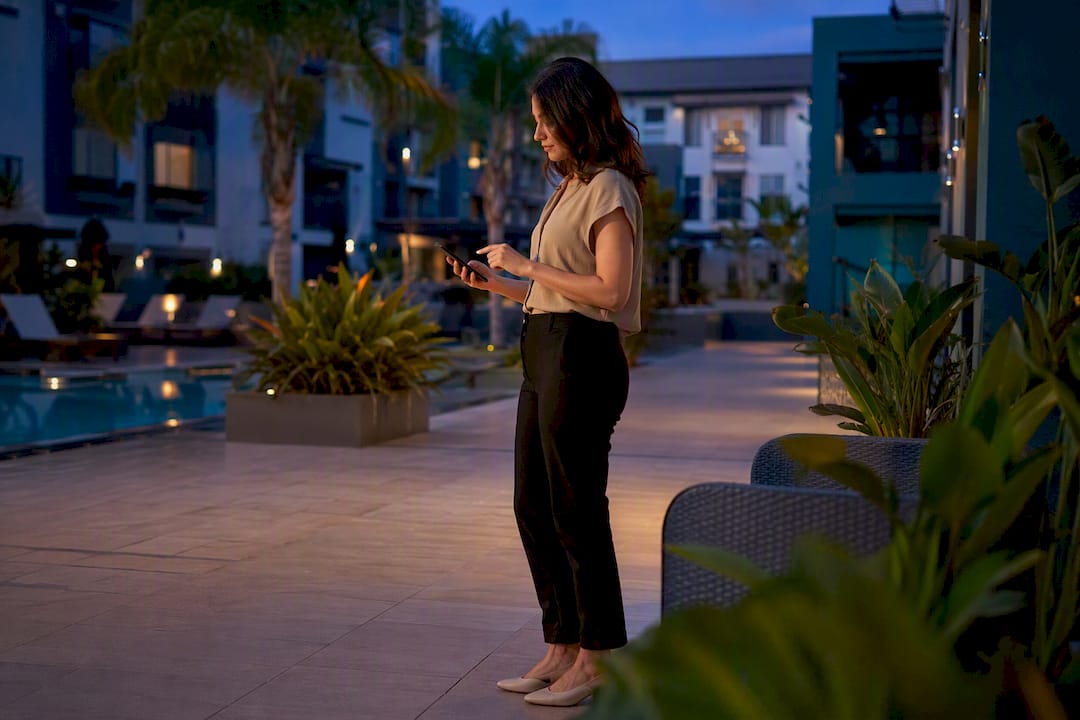 Person using smartphone for apartment tour