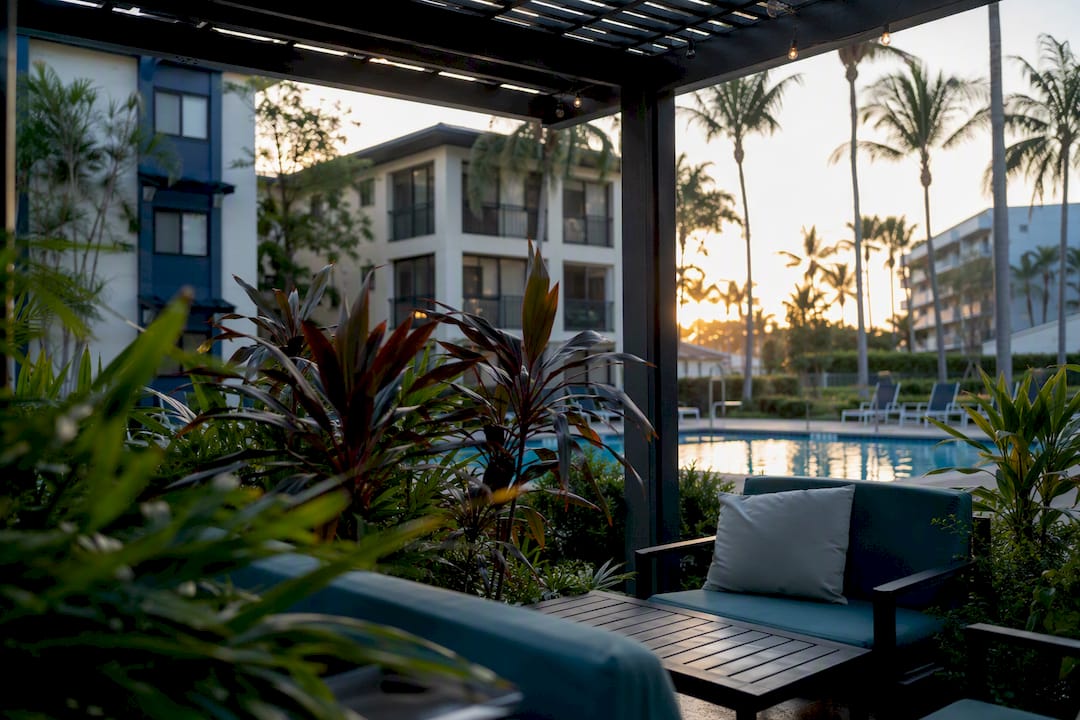 Modern Boca Raton apartment with tropical landscaping