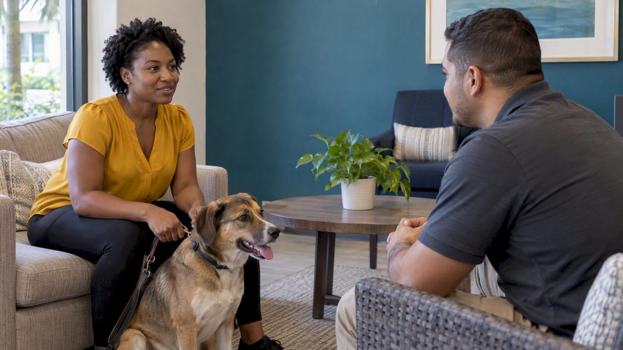 Renter and manager interview with a calm dog